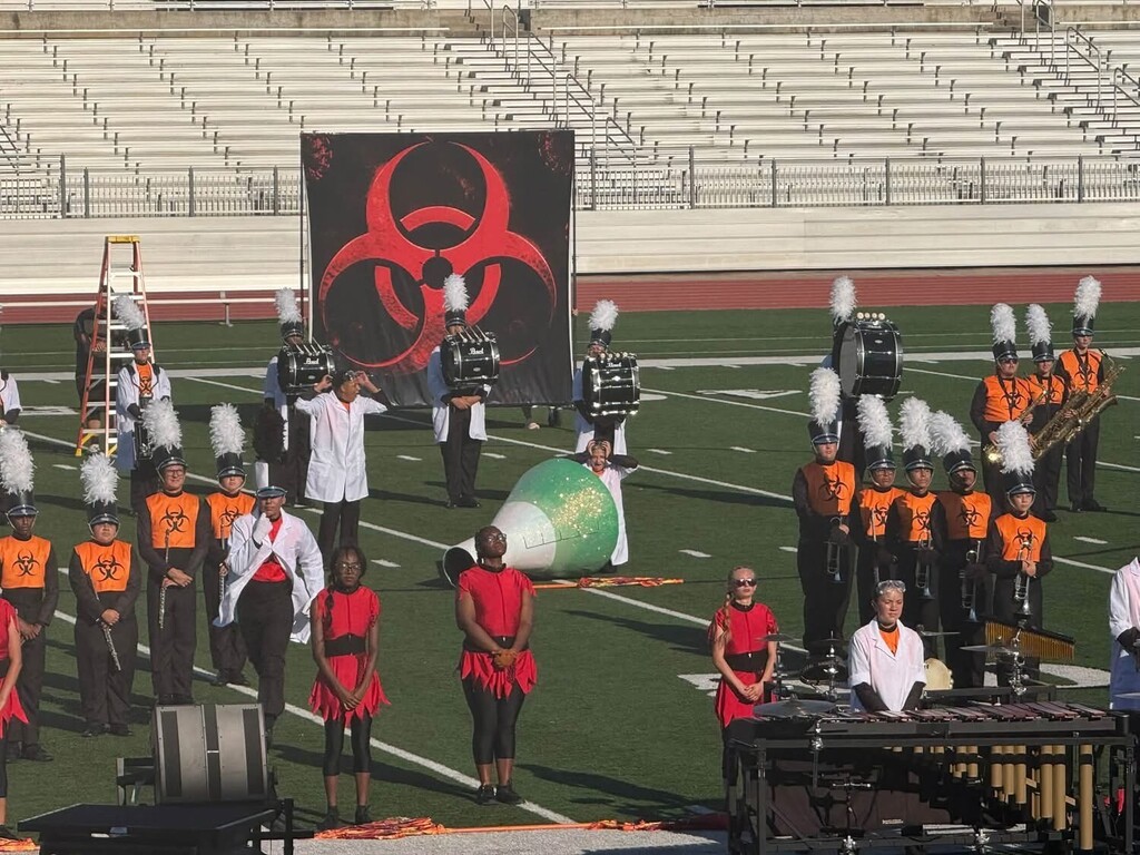 Band members during their routine at Challenger Stadium