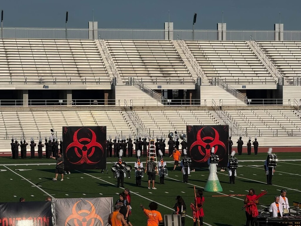 Band members during their routine at Challenger Stadium