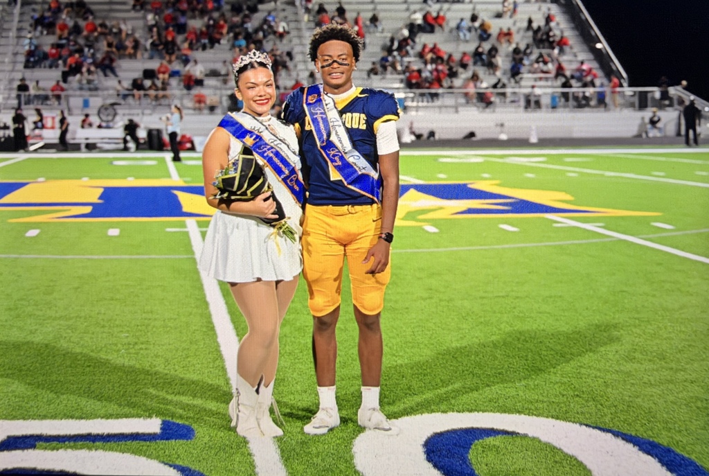 Homecoming Queen and King on the 50-yard line at halftime