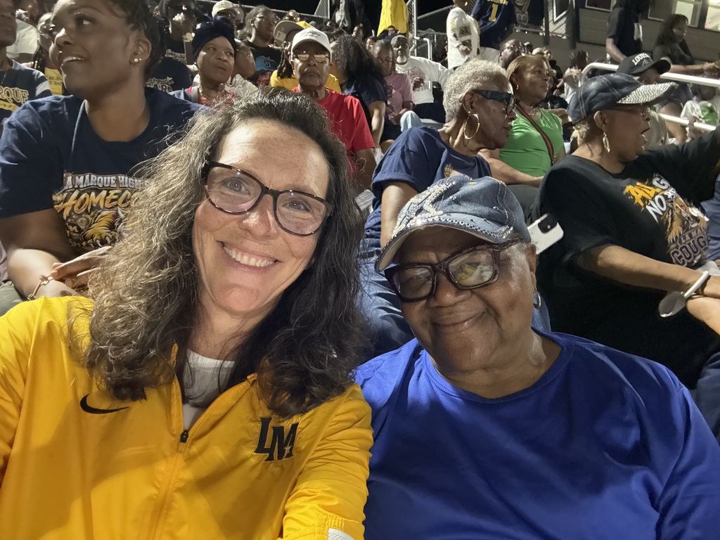 Superintendent pictured with a Super Fan