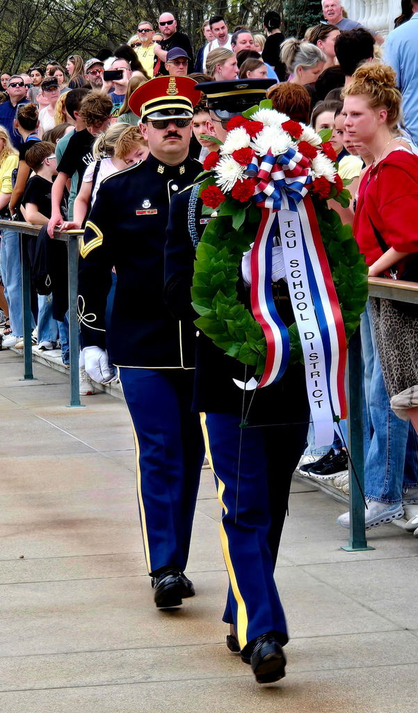 Pictures include: Wreath laying ceremony, meeting the lead from Aladdin on Boardway, and a group picture at the Capitol. 