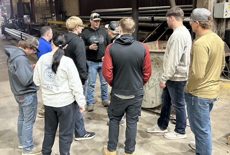 Junior explaining the old machines and how they worked.