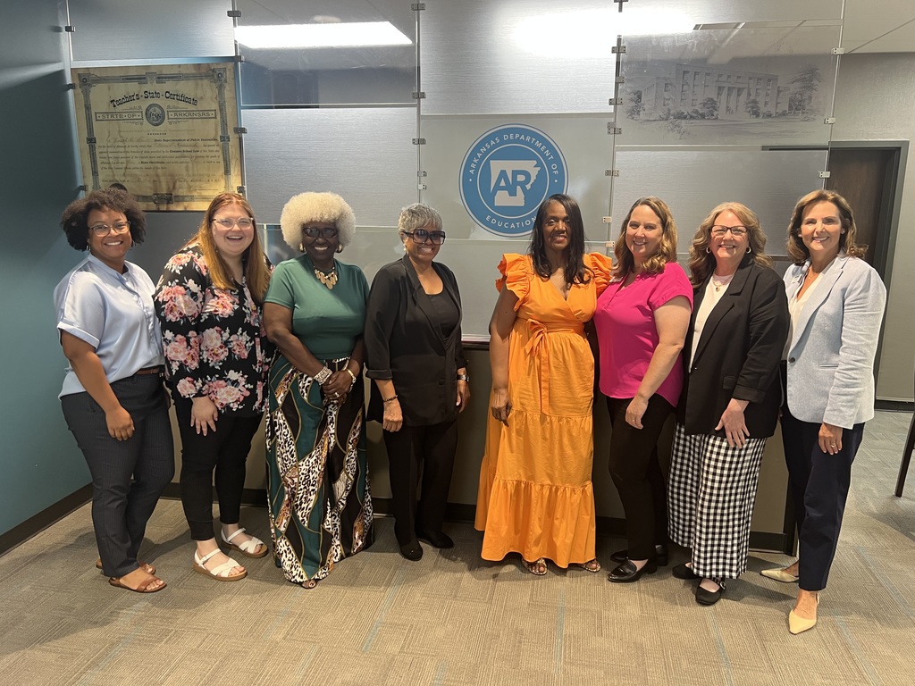Photo of Graduates and Excel Center staff at the Department of Education