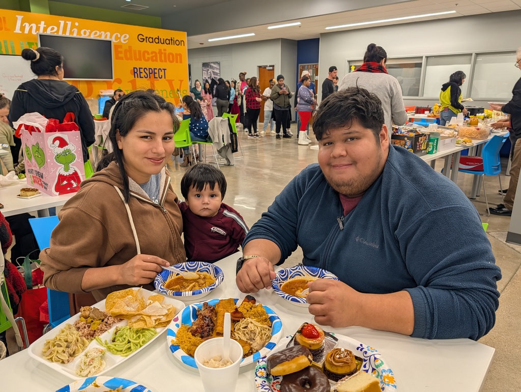 Photo  of students at holiday potluck