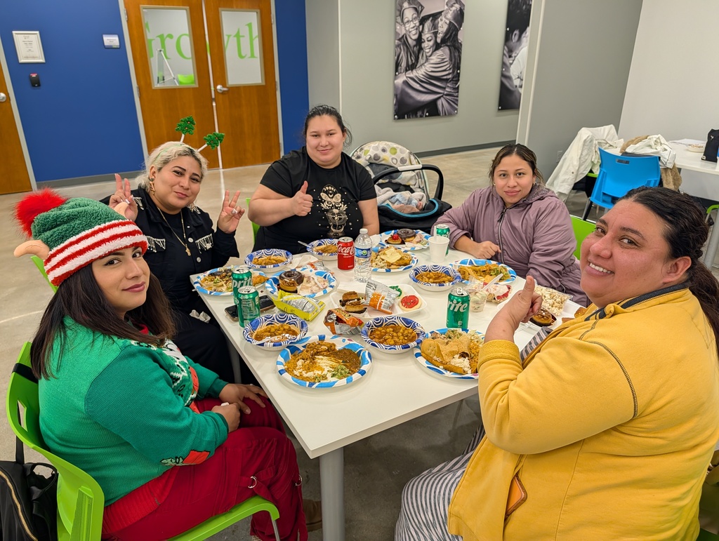 Photo  of students at holiday potluck