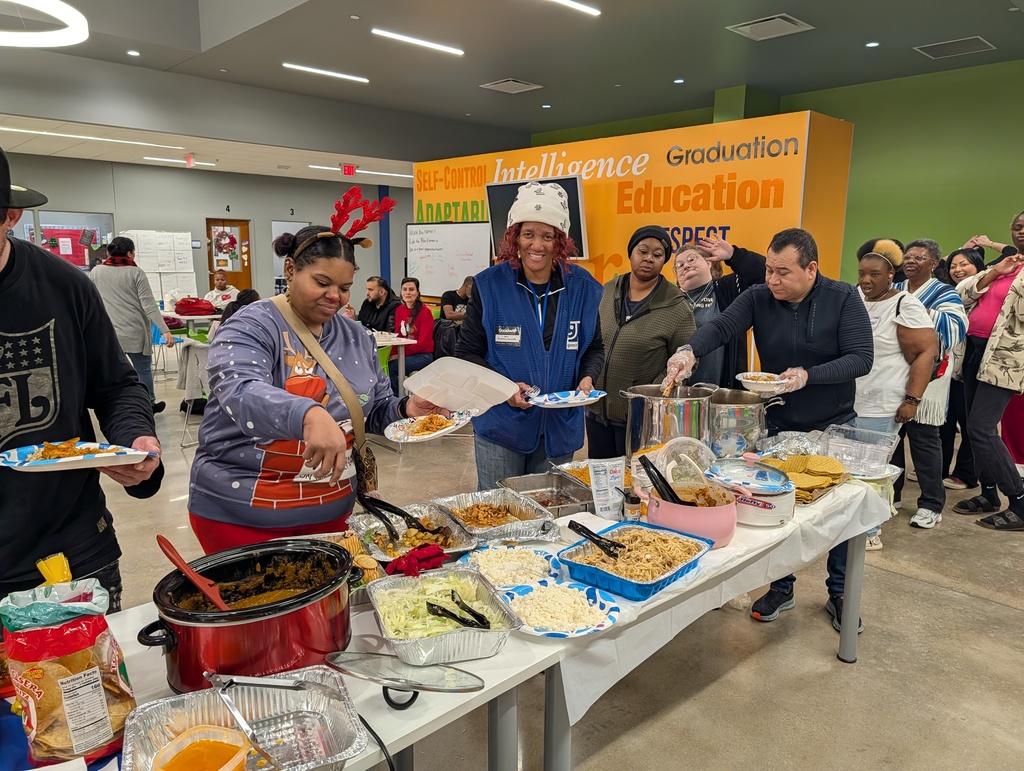 Photo  of students at holiday potluck
