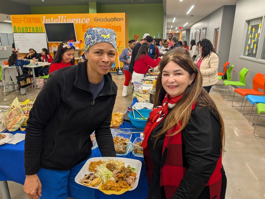 Photo  of students at holiday potluck