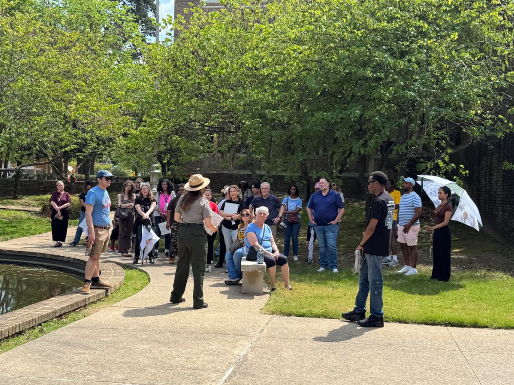 Photo of group of students listening to Park Ranger Heather