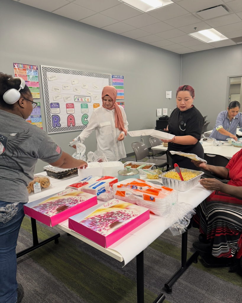 Students eating food brought for the class