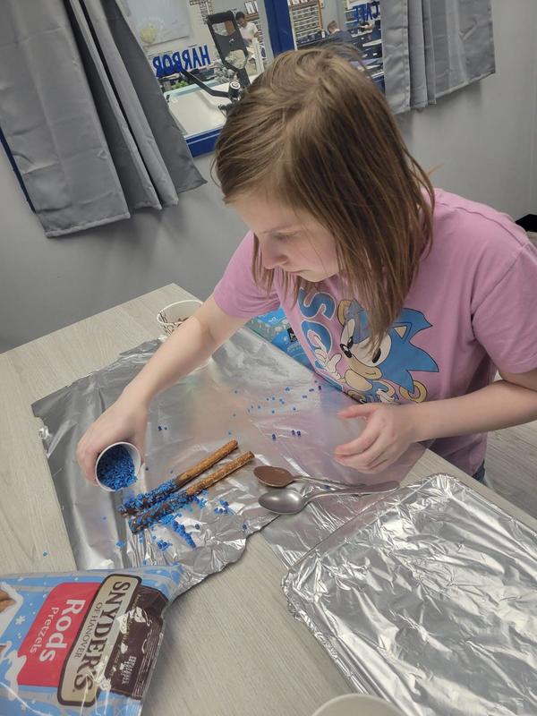 Student making pretzels
