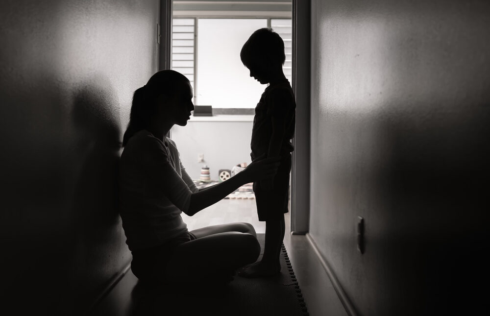 adult talking to kid