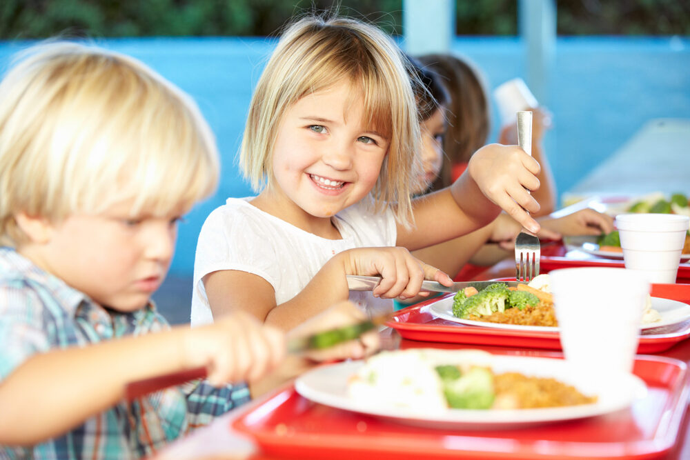 kids eating with utensils