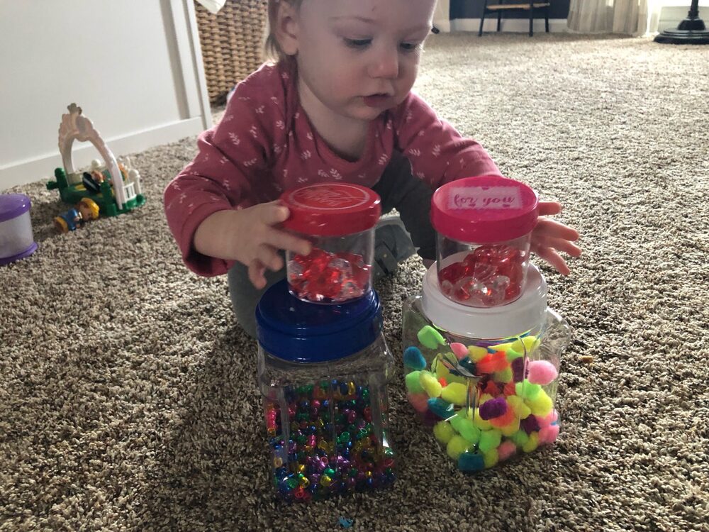 kid playing with sensory toys