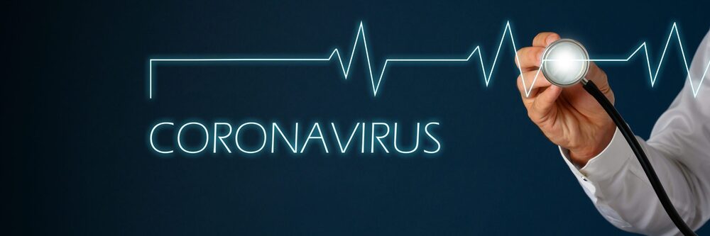 A hand holding a stethoscope next to a glowing heartbeat line and the word "CORONAVIRUS."