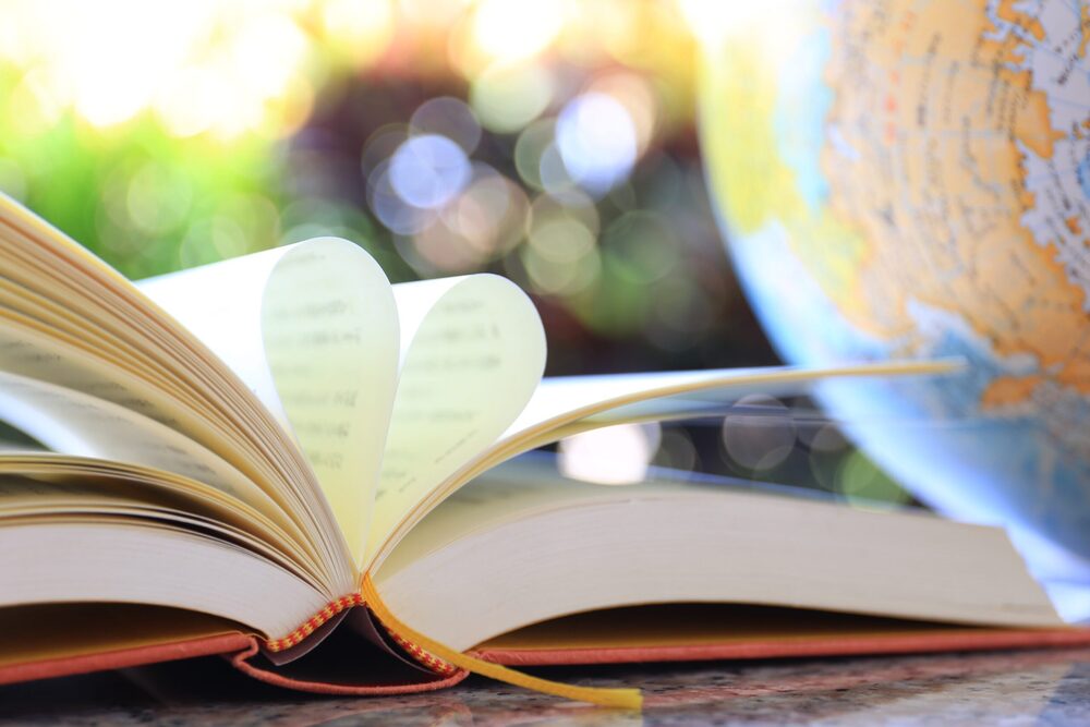 book with pages folded to form a heart