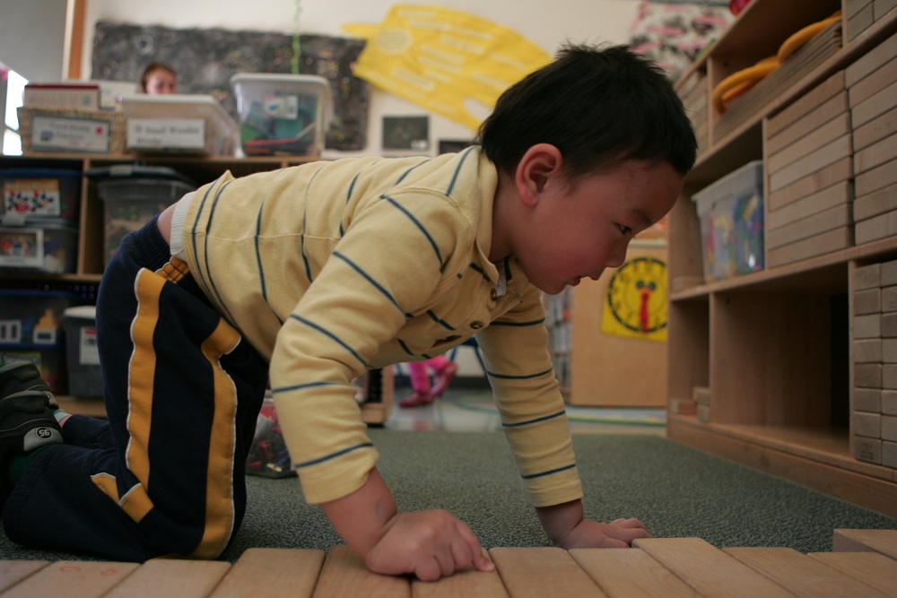 kid playing on the floor