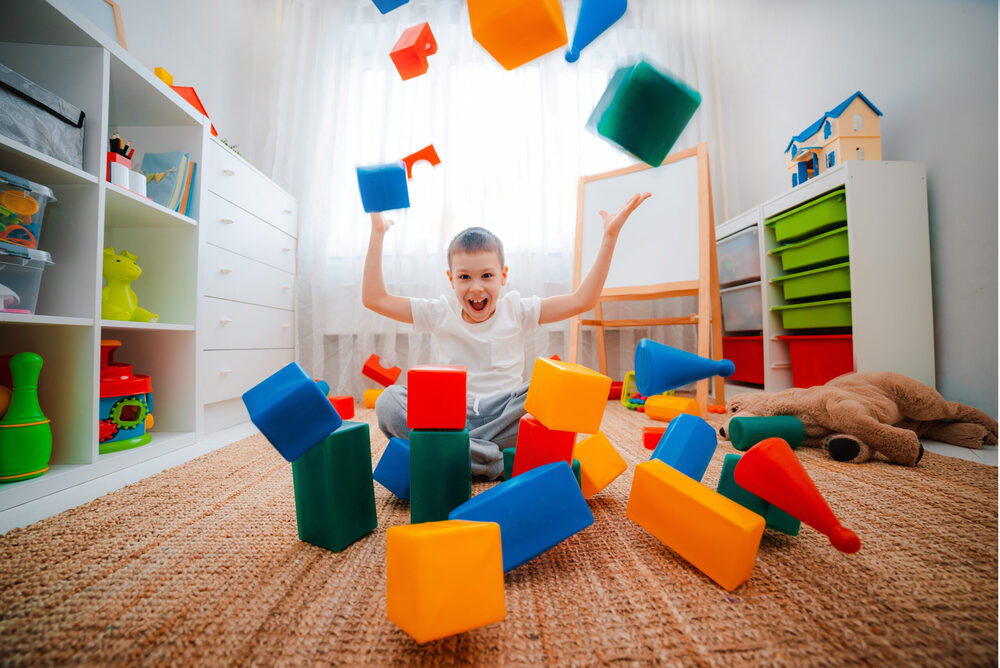 kid playing with blocks