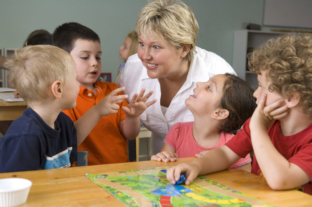 kids and teacher in classroom