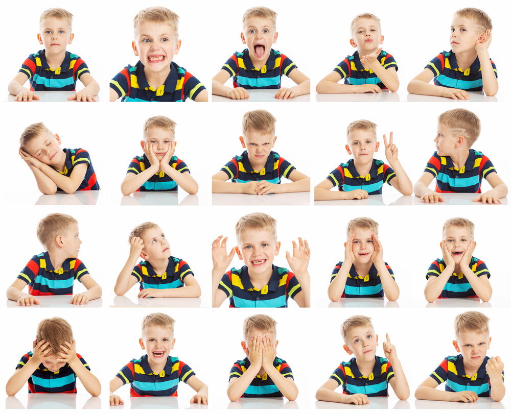 20 panels of a blonde child in a striped shirt making various faces