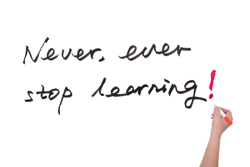 "never, ever stop learning!" sign