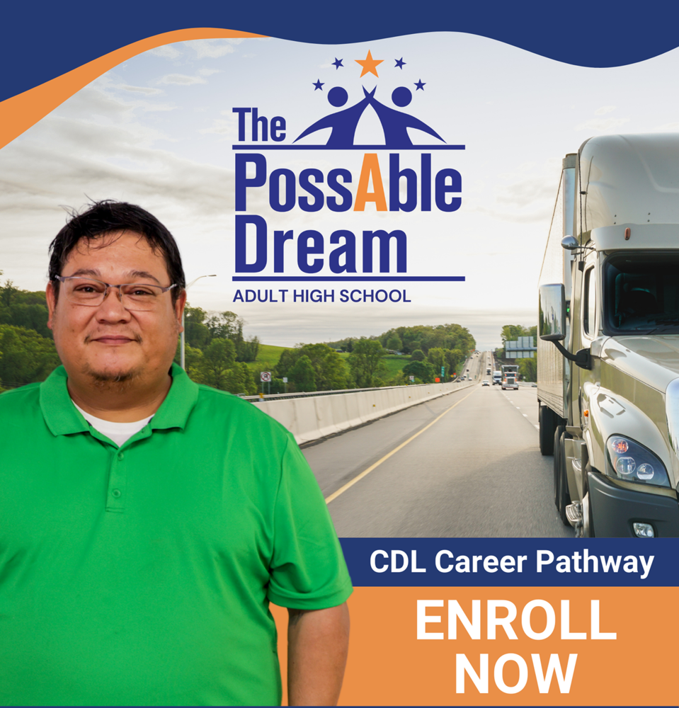 Man posing in front of promotional flyer for The possable dream CDL career pathway