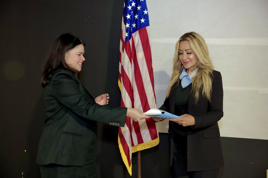 board member being sworn in