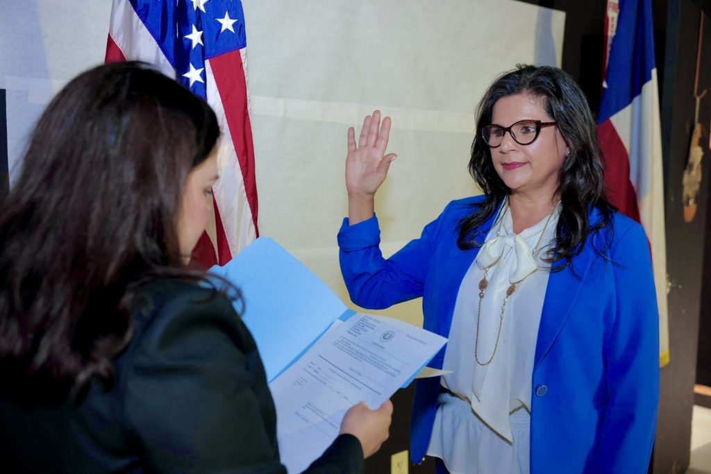 board member being sworn in