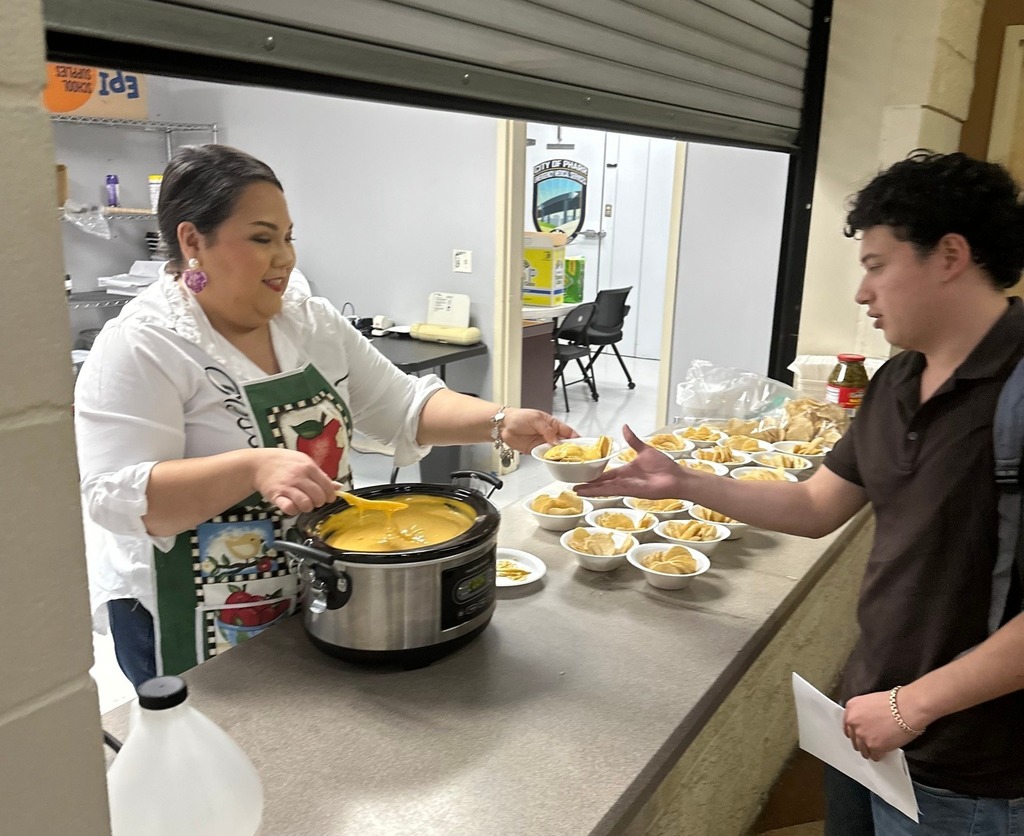 teacher serving nachos