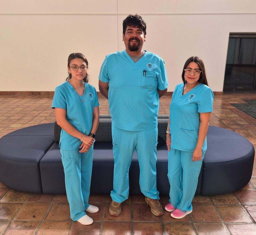 three nursing students posing for the camera