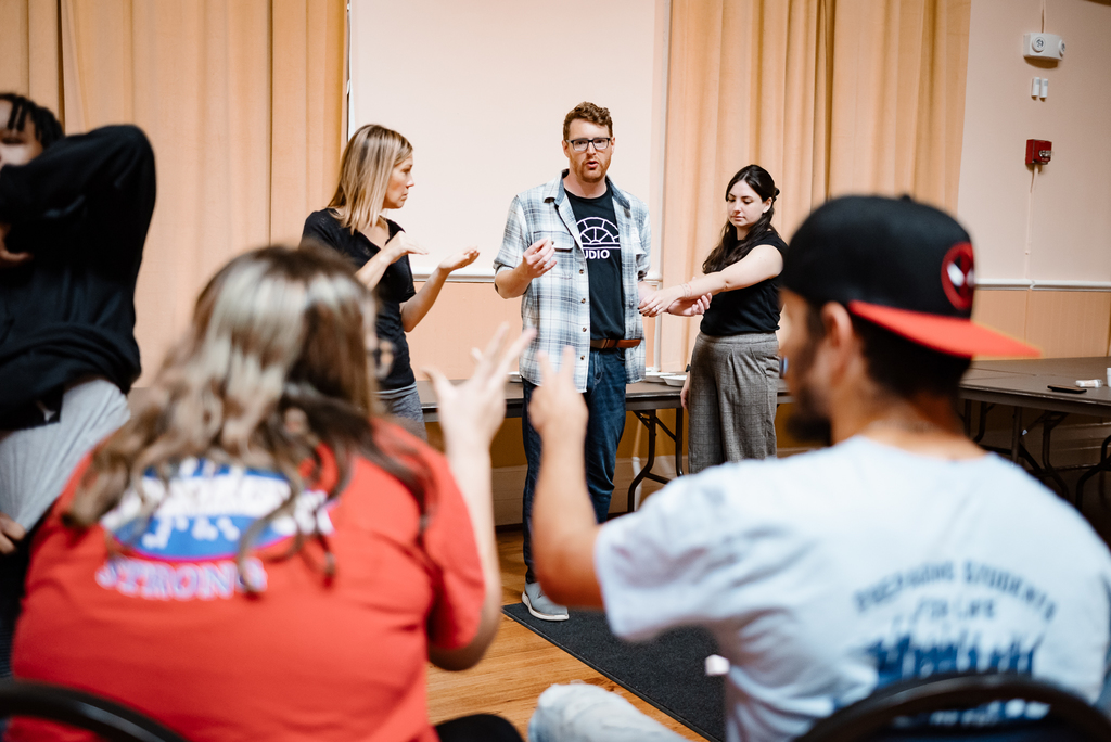 deaf department students learning about making wounds with makeup