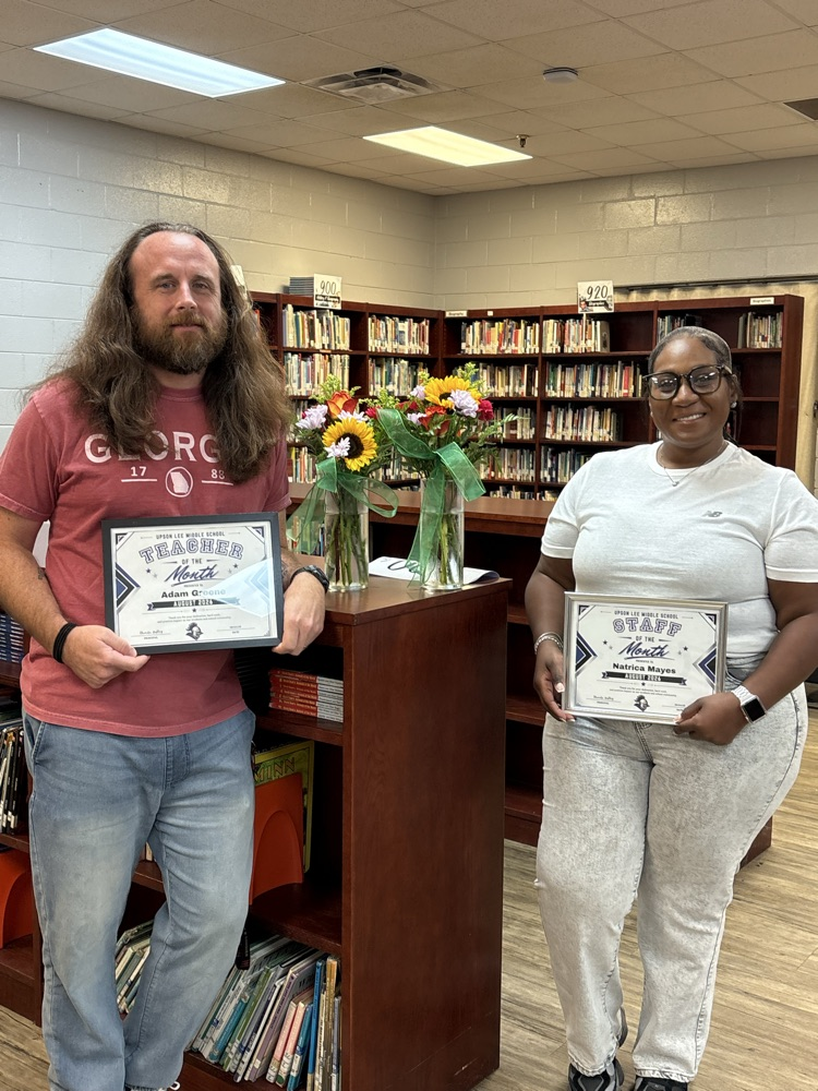 Adam Greene,Teacher of the Month and Natrica Mayes, Staff of the Month