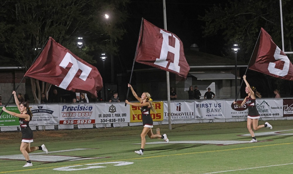Cheerleaders celebrate touchdown at Sumter game