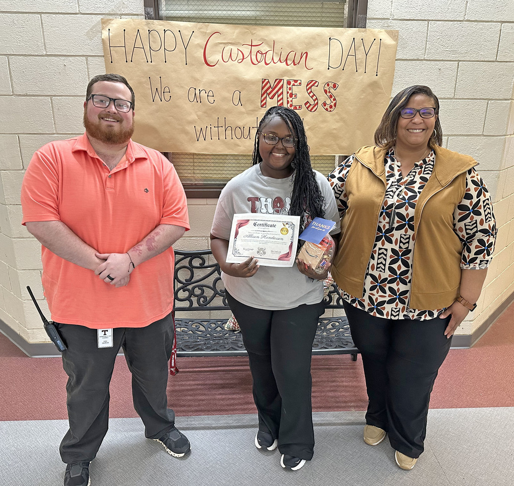 Allison Henderson (center), custodian at Thomasville Elementary School, was recognized Oct. 2 in recognition of National Custodian Day. She is pictured with John Sheffield, TES Assistant Principal; and Melissa Washington, TES Principal. Not pictured is Jamie Jones.