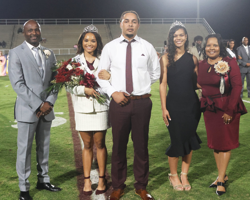 Pictured are Eddie Armstead Jr., THS Principal; Imani Brothers, THS Homecoming Queen 2025; father Juan Brothers; Amaya Jones, THS Homecoming Queen 2024; and April Bouler, THS Assistant Principal.