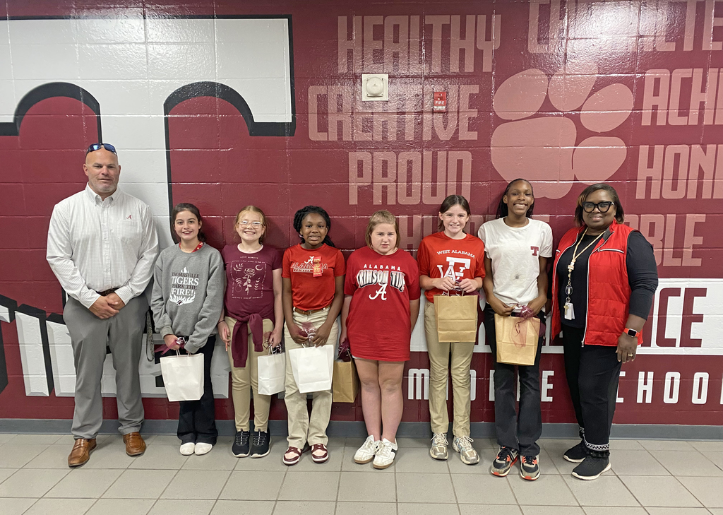 Fifth and sixth grade students at Thomasville Middle School were given the opportunity to participate in the Red Ribbon Week coloring contest. Winners are Callie Phillips, Kyleigh Motes, Gabrielle Mosely, Lily Parnell, Henleigh Rush, and Kaylani Campbell. They are pictured with Brad Elam, TMS Principal; and Renae Williams, TMS Assistant Principal.
