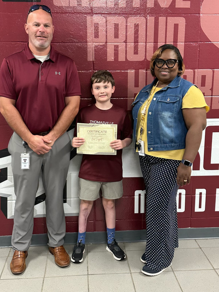 Jad Doggett (center), fifth grade student, has been named as a "Student of the Month" for October 2025 at Thomasville Middle School. He is pictured with Brad Elam, TMS Principal; and Renae Williams, TMS Assistant Principal.