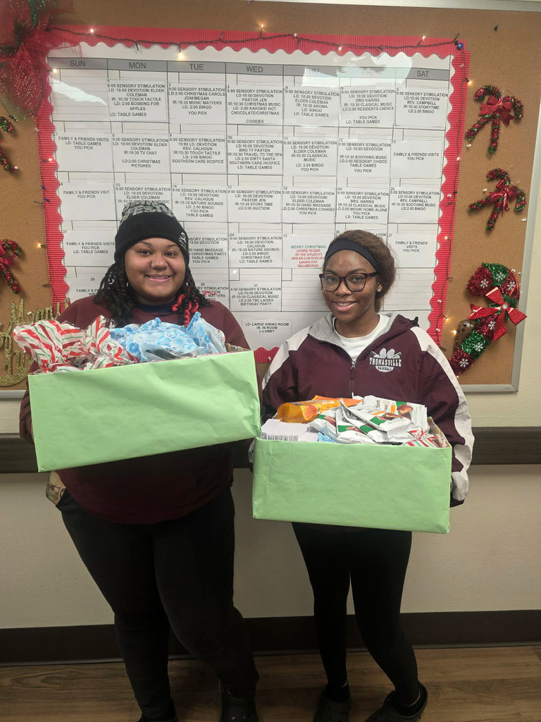 JaKyra Chapman and Jazlyn Morrissette, members of the Thomasville High School chapter of HOSA-Future Health Professionals, delivered candy and Christmas cards to the residents at Crown Health Rehabilitation and Nursing Care Facility as part of Operation Christmas Joy.
