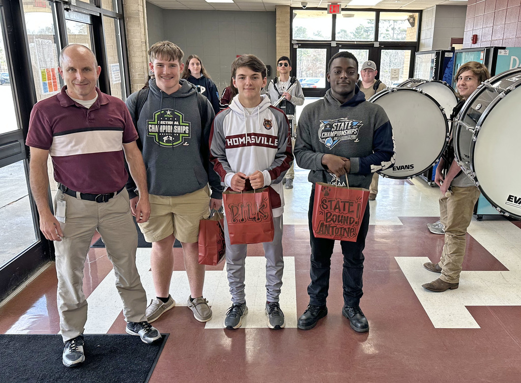 Brayden Williams, Coleman Pilkington, and Antione Pitts of the Thomasville High School Tigers wrestling team were given a send off Feb. 11 as they prepared to travel to Huntsville for the state tournament Feb. 12-14 in the Von Braun Center. Also pictured is James Russell (left), THS Assistant Wrestling Coach.
