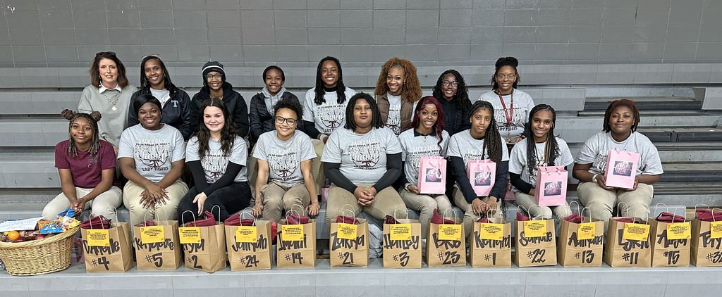Vickie Morris, Thomasville City School Superintendent offered a devotional Feb. 23 for the Thomasville High School Lady Tigers basketball team as they prepared to travel to Montgomery. Thomasville will play Mobile Christian at 9 a.m. on Tuesday, Feb. 24 in the second game of the South Regional Tournament at Garrett Coliseum. In addition, teachers and school employees at THS prepared spirit bags full of snacks for the team's trip to Montgomery.