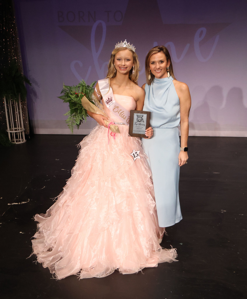 Chelsea Doggett (right), emcee of the TMS Beauty Review, is pictured with Rayleigh Powell, Top Beauty of the Fifth/Sixth Grade Division.