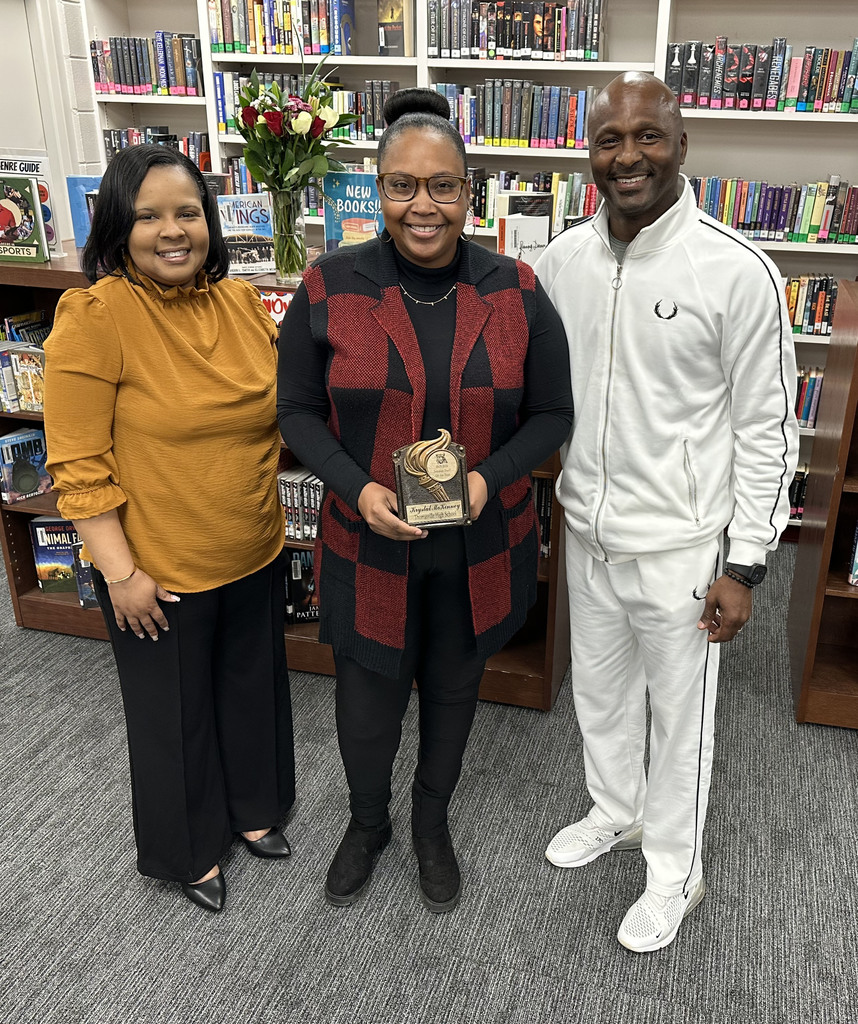 Krystal McKinney (center), Access Facilitator, was honored as "Support Staff of the Year" at Thomasville High School. She is pictured with April Bouler, THS Assistant Principal; and Eddie Armstead Jr., THS Principal.