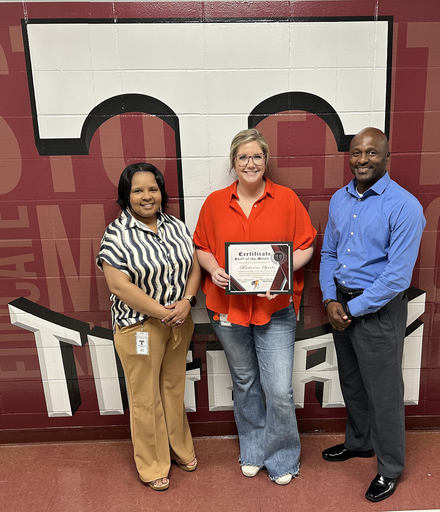 Katherine Sparks (center), history teacher, has been chosen as the "Staff Member of the Month" for March 2026 at Thomasville High School. She is pictured with April Bouler, THS Assistant Principal; and Eddie Armstead Jr., THS Principal.