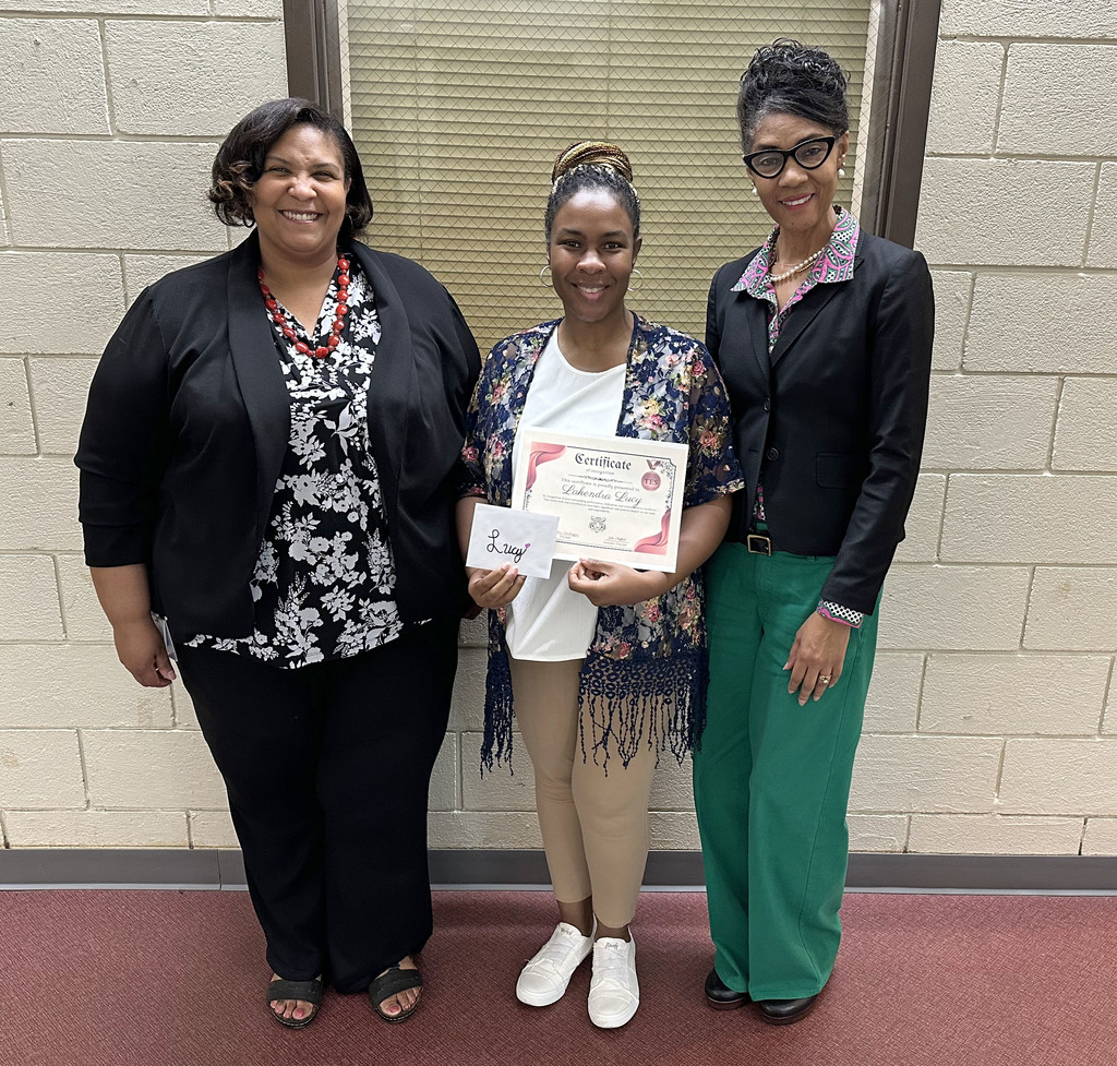 LaKendra Lucy (center), Clerical Aide, was recognized April 22 by Thomasville Elementary School for Administrative Professionals Day. She is pictured with Melisa Washington, TES Principal; and Sharon Owes, Counselor.