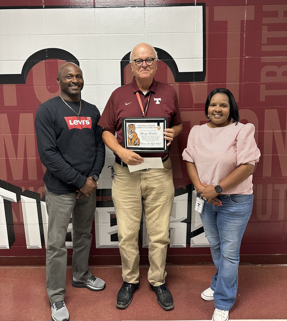 Barry H. Hendrix (center), Marketing and Communications Manager for the Thomasville City Schools District, was recognized May 8 by Thomasville High School for National School Communicators Day. He is pictured with Eddie Armstead Jr., THS Principal; and April Bouler, THS Assistant Principal.