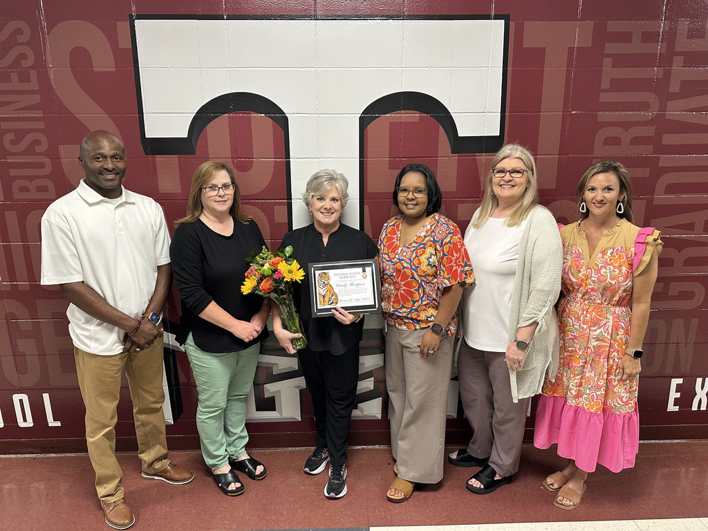 Candy Thompson (second from left), Lead School Nurse, was recognized for National School Nurse Day by Thomasville High School. She is pictured with Eddie Armstead Jr., THS Principal; Candace McConnell, Bookkeeper; April Bouler, THS Assistant Principal; Cindy Hare, Secretary; and Chelsea Doggett, THS Career Coach.