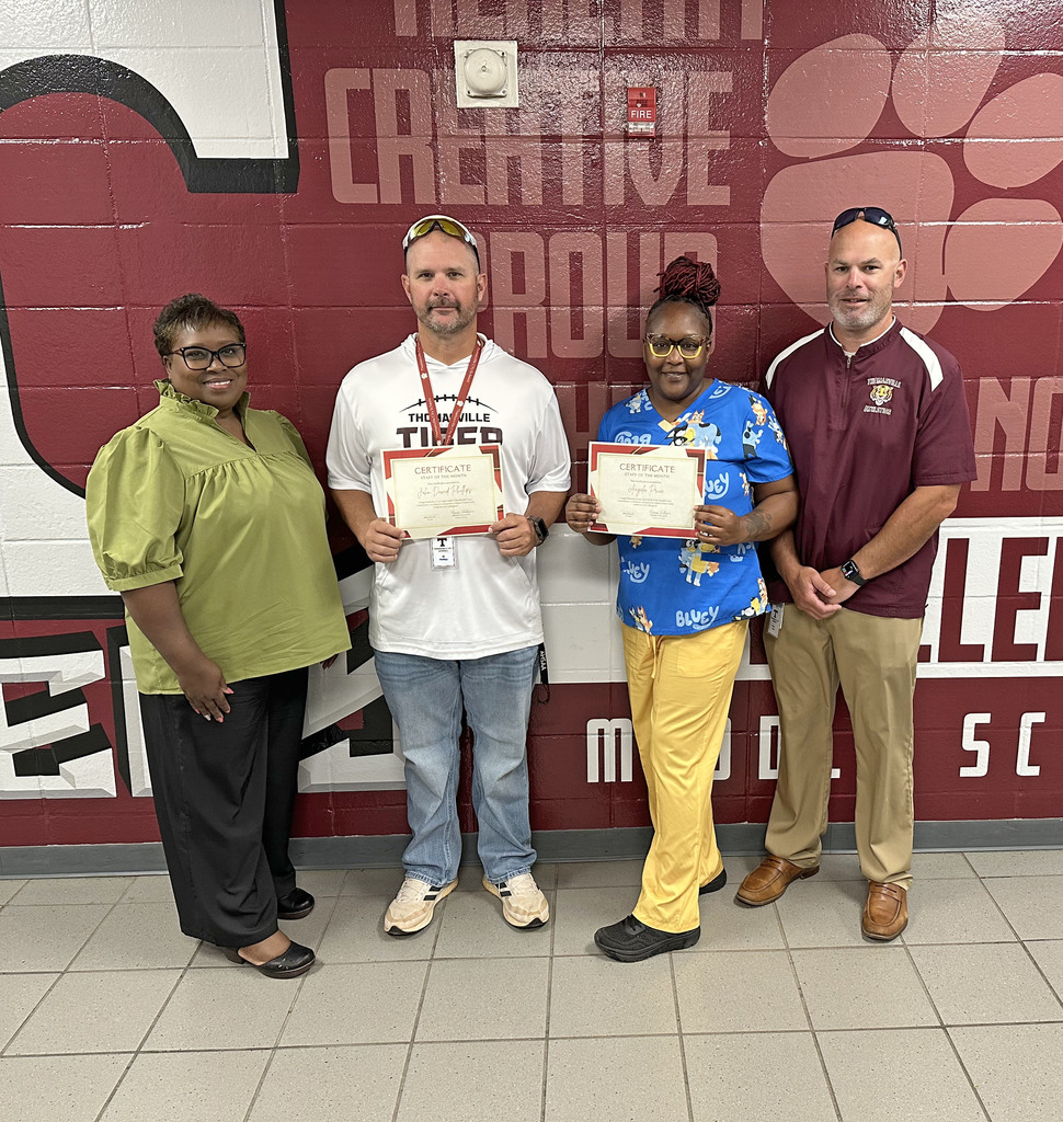 "Staff Members of the Month" for April 2026 at Thomasville Middle School: John David Phillips, History Teacher; and Angela Price, Child Nutrition Program Manager. They are pictured with Renae Williams, TMS Assistant Principal; and Brad Elam, TMS Principal.