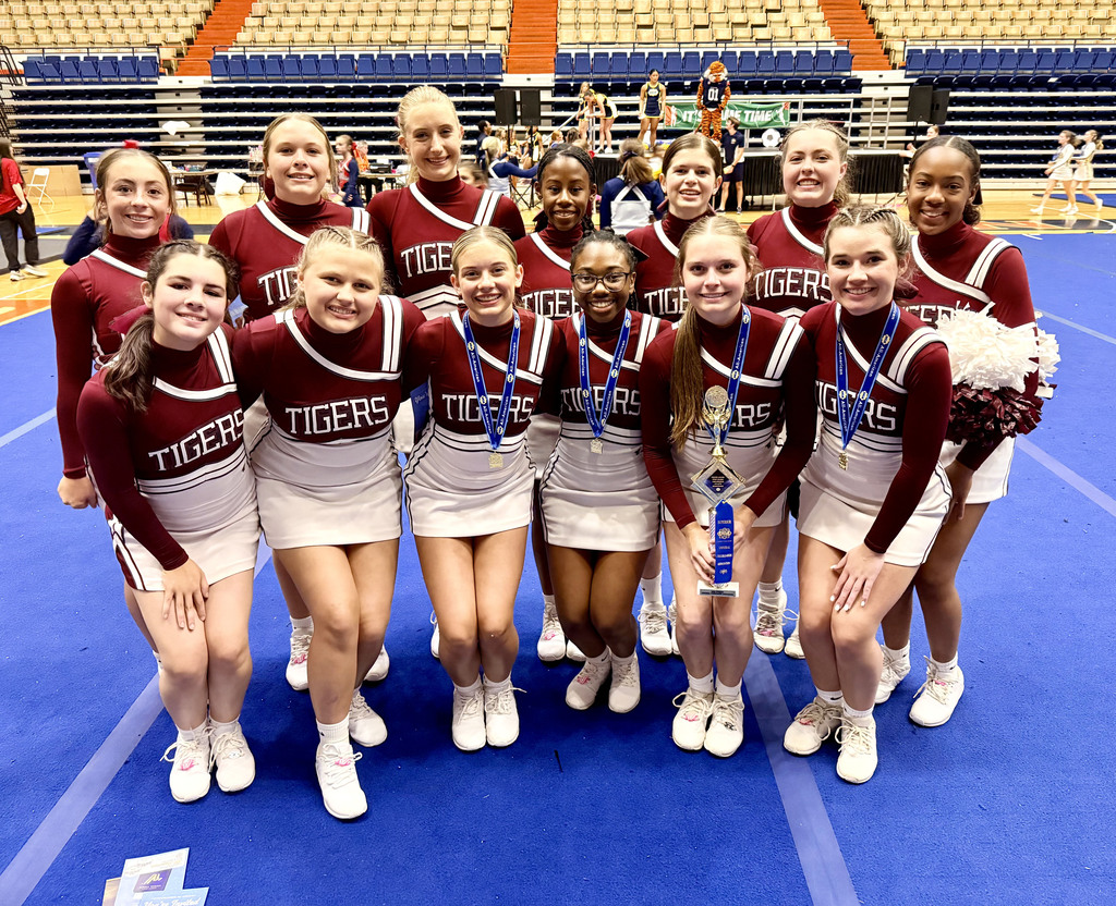 The THS cheerleaders for 26-27 received the following awards June 3 at Universal Cheerleaders Association (UCA) Cheer Camp at Auburn University: • A spirit stick each day of camp for the entire Tiger program; • Blue ribbons for camp routine and for Sideline evaluations;  • Second Place in Camp Dance Routine. Thanks to Elizabeth Ledkins for the photo.