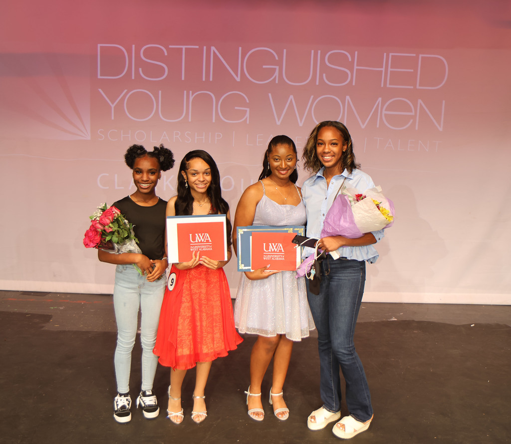 Kristin Howard and Keyana Bettis (center), students at Thomasville High School, participated June 6 in the annual Distinguished Young Women program at the Thomasville Civic Center. Howard is pictured with “Little Sister” Jaliyah Bryant (left). Bettis is pictured with “Little Sister” Ja’Kyeria Patterson.