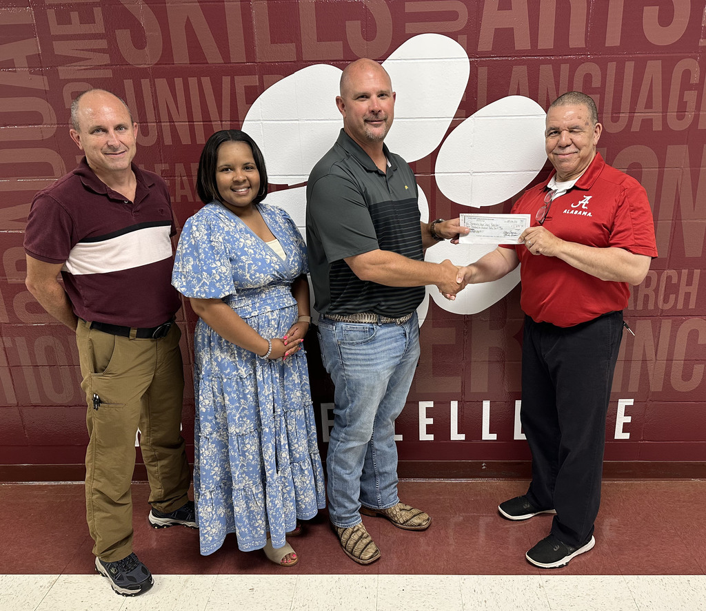 The Thomasville High School Tigers baseball program received a $12,632.78 grant for a turf project from the Clarke County Park and Recreation Board. Pictured are Jay Russell, THS Assistant Principal; April Bouler, THS Principal; John David Phillips, THS Head Baseball Coach; and Darryl D. Perryman, chairman of the Clarke County Park and Recreation Board.