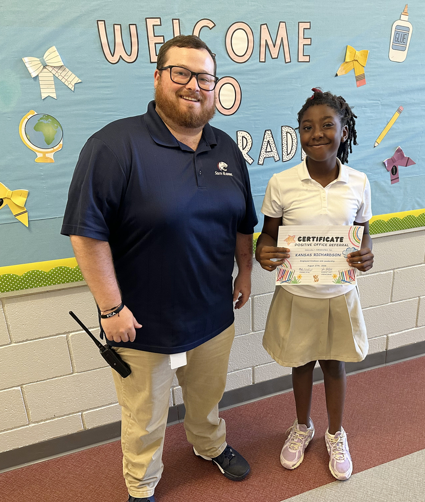 Kansas Richardson, a fourth grade student at Thomasville Elementary School, has received a Positive Office Referral for displaying kindness and leadership. She is pictured with John Sheffield, TES Assistant Principal.